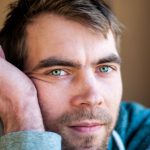 men ignoring eye health